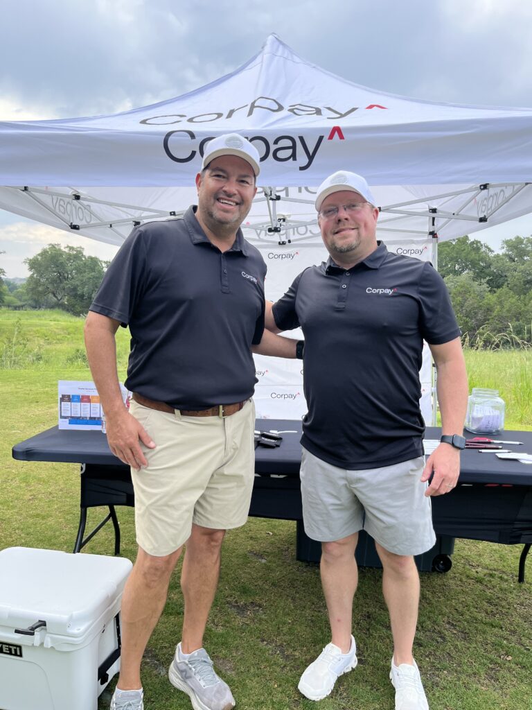The Corpay team takes a photo during the Driving fore Donors Golf Tournament
