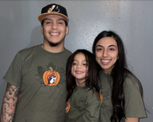 Daniel Michael Moreno smiles with the camera with his family.