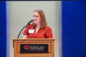 Foundation leader speaking about the 2026 Red & White Ball at board meeting