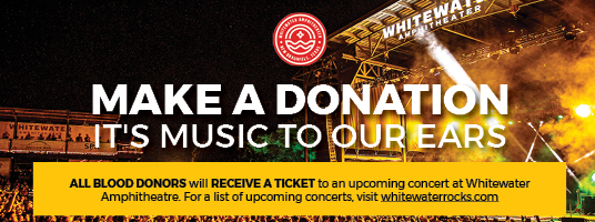 Concert stage with donation message banner